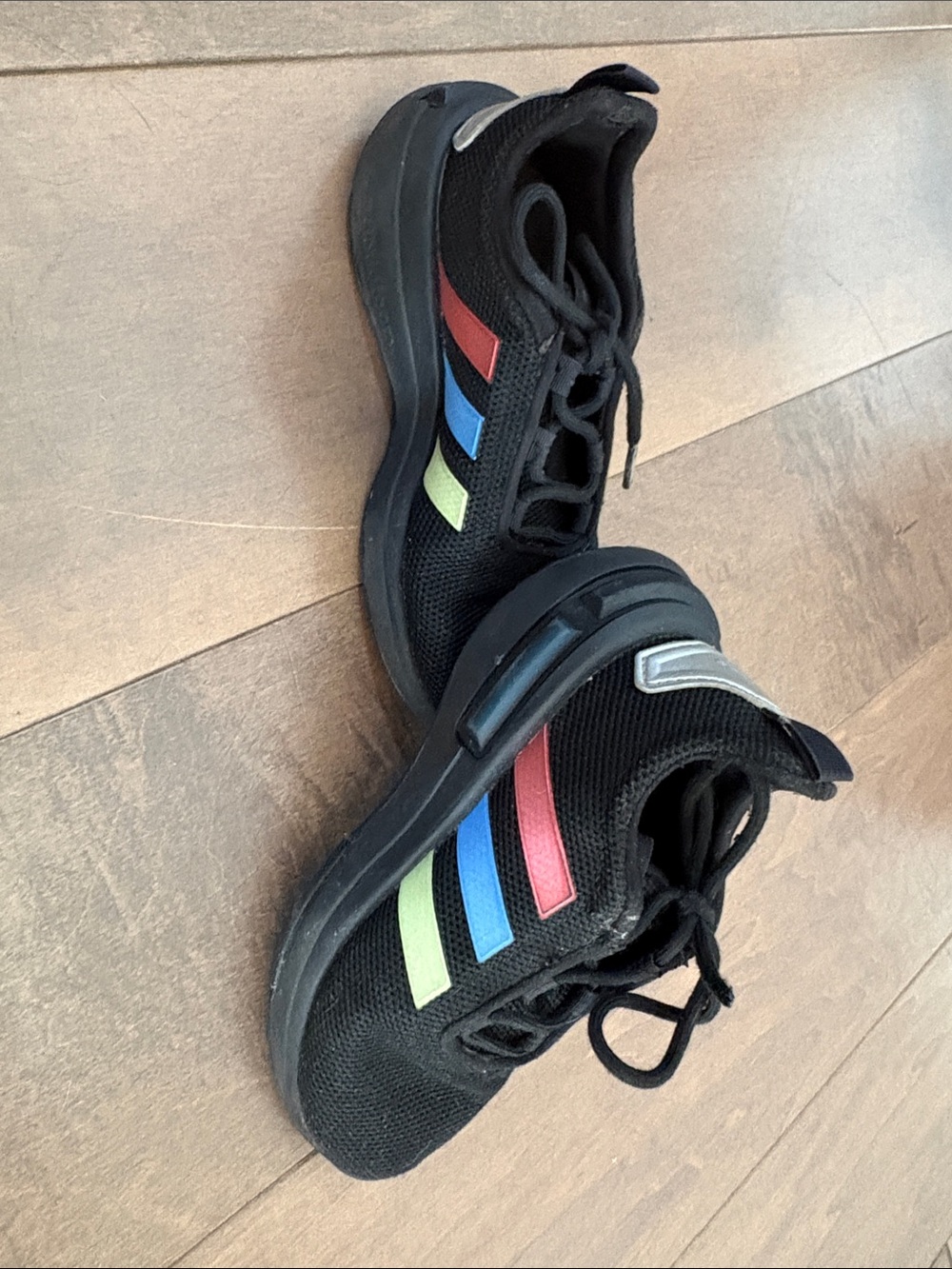 adidas Black Kids Sneakers with Red, Blue, and Lime Stripes